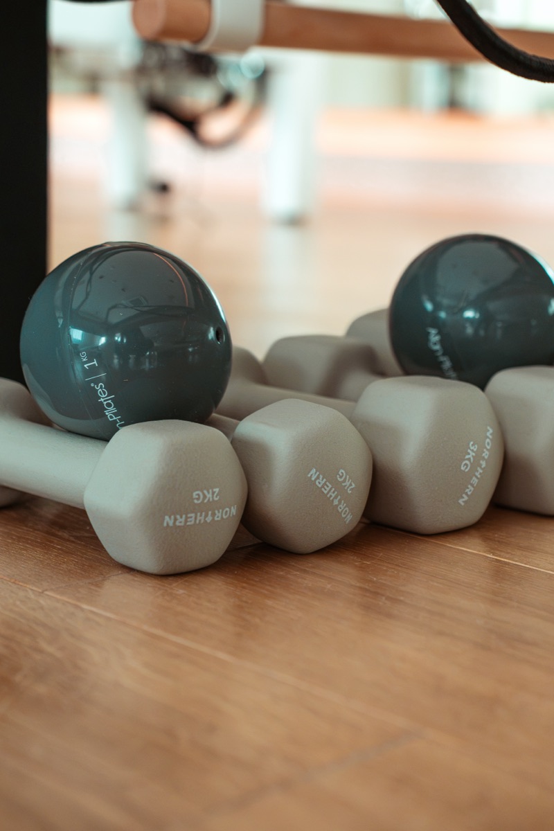 Neoprene hand weights and a weighted toning ball at Encourt Pilates